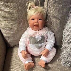 Lee Middleton Original Doll 1997.   Blonde Baby Doll with Pink Elephant Outfit